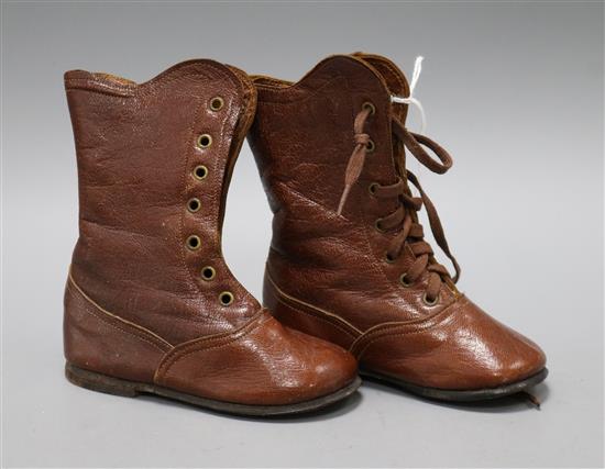 A pair of 19th century childs boots 14cm high